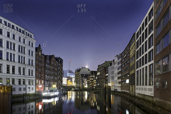 Night view of Old Town in Hamburg, as seen from the canal