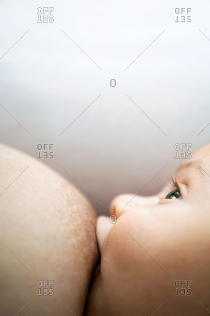 Close up of a breast feeding baby