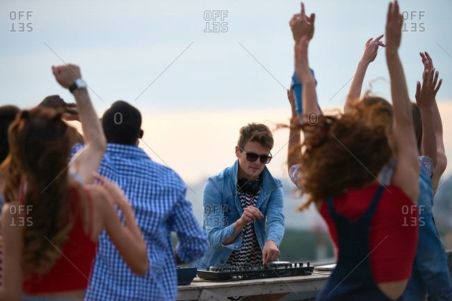 DJ working at rooftop party