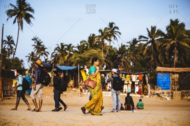 Goa India January 16 2016 Travelers On Anjuna Beach In