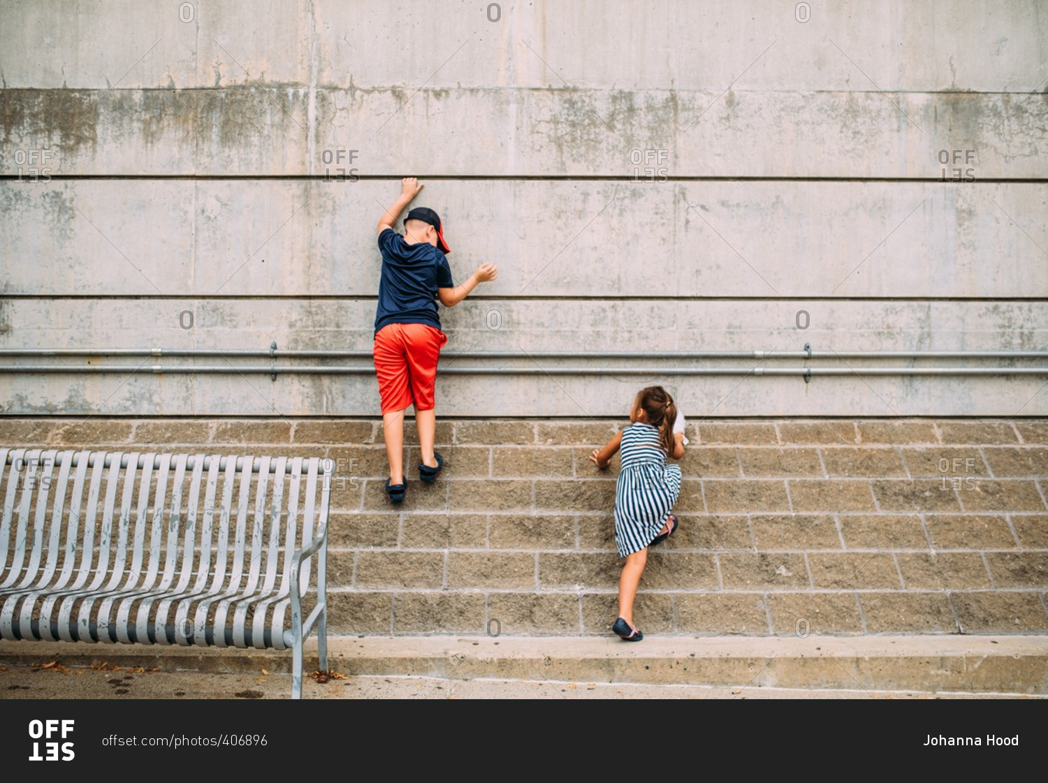 Kids scaling a wall - Offset stock photo - OFFSET