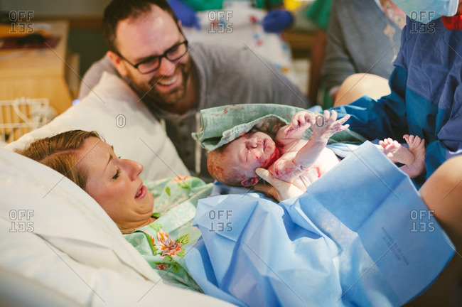 giving birth stock photos - OFFSET