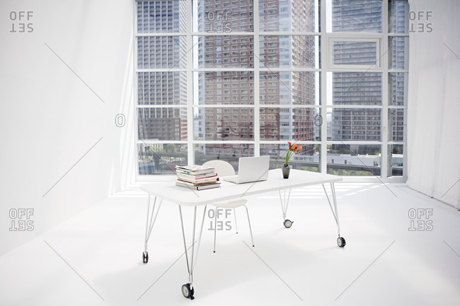 A sparse white office - Offset