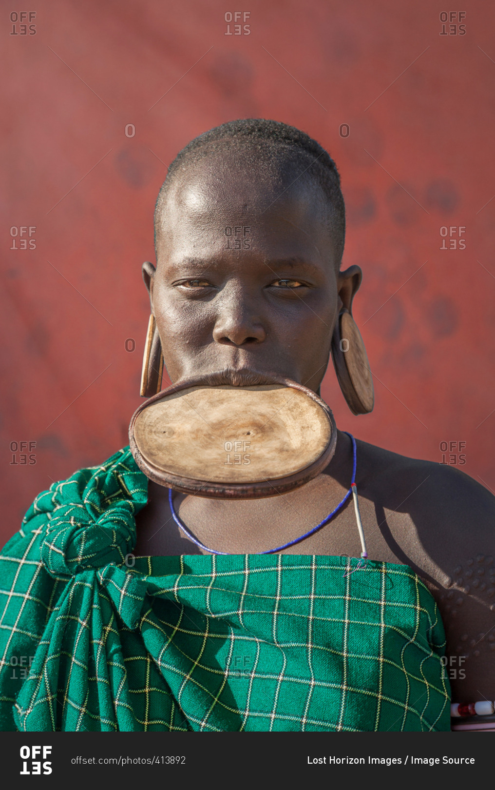 Woman of the Mursi Tribe with disc in her lower lip, Omo Valley ...