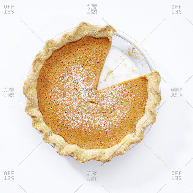 Overhead view of sweet potato pie with slice removed