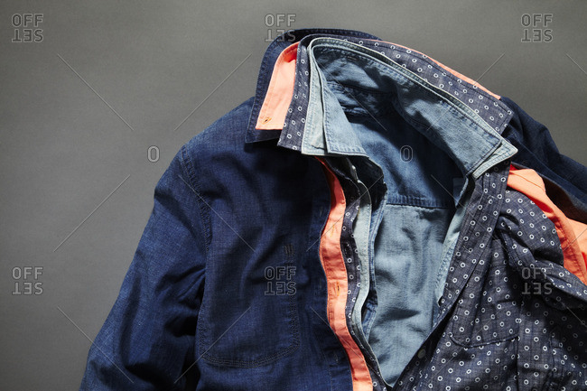 Long sleeved shirts layered one inside the other