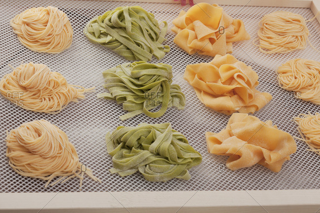 Pasta Nests Drying On A Rack Stock Photo Offset