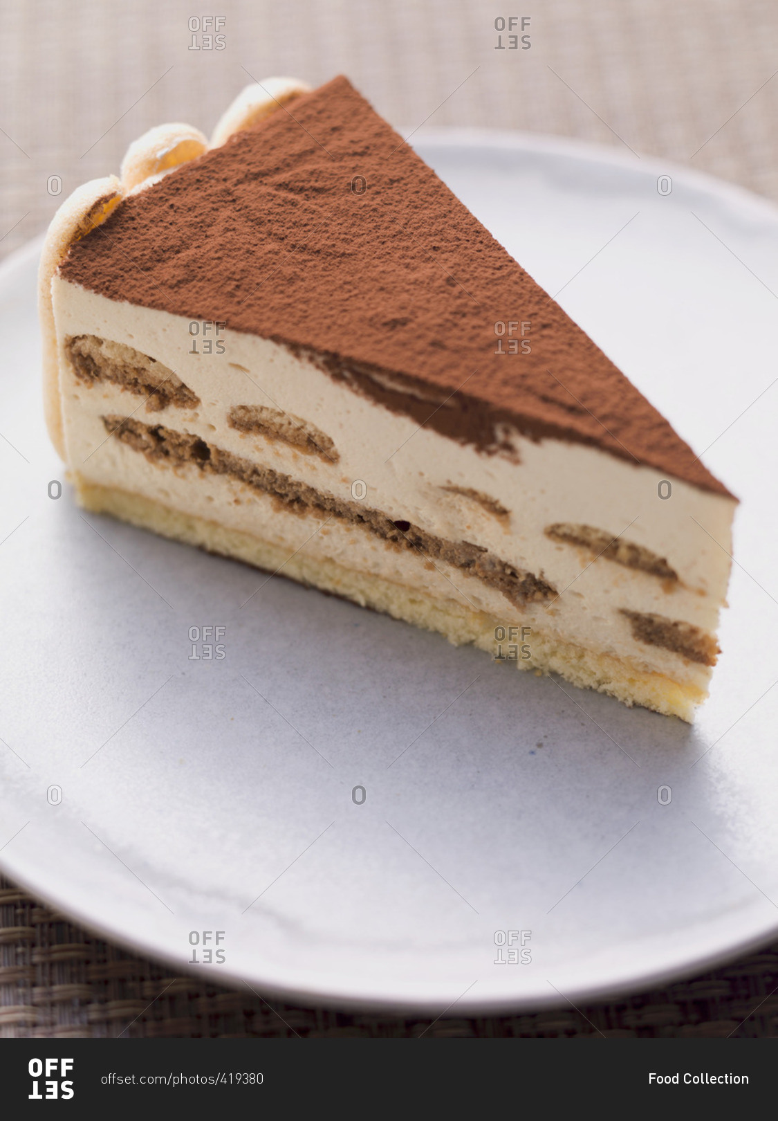 A Slice Of Tiramisu Cake Stock Photo Offset