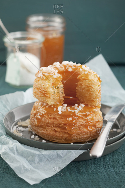 Apricot doughnuts made from puff pastry with sugar crystals