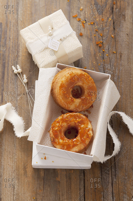 Caramel doughnuts with a cream filling as a gift