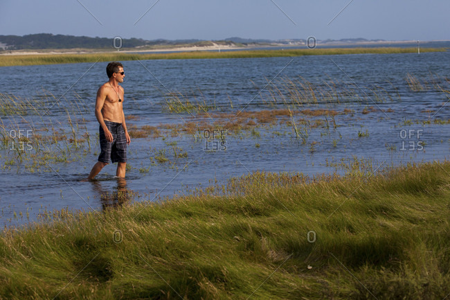 Man Standing At Hatches Harbor In Provincetown