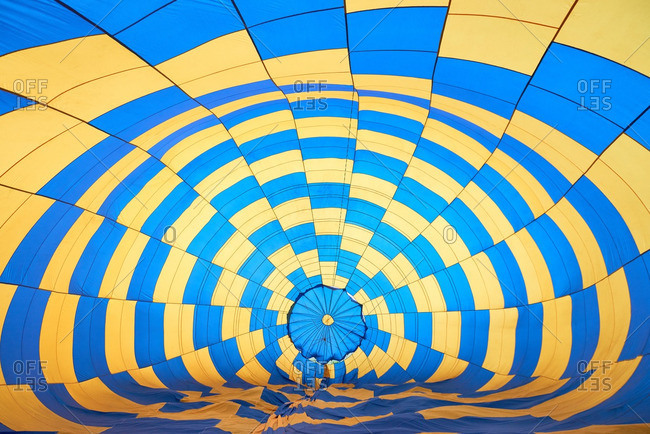 Bright blue and yellow hot air balloon