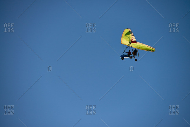 Man driving powered hang glider