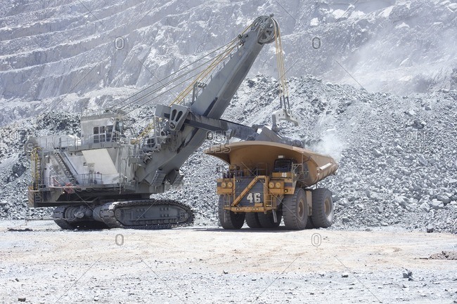 Huge Dump Trucks in Open Pit Copper Mine, Northern Chile