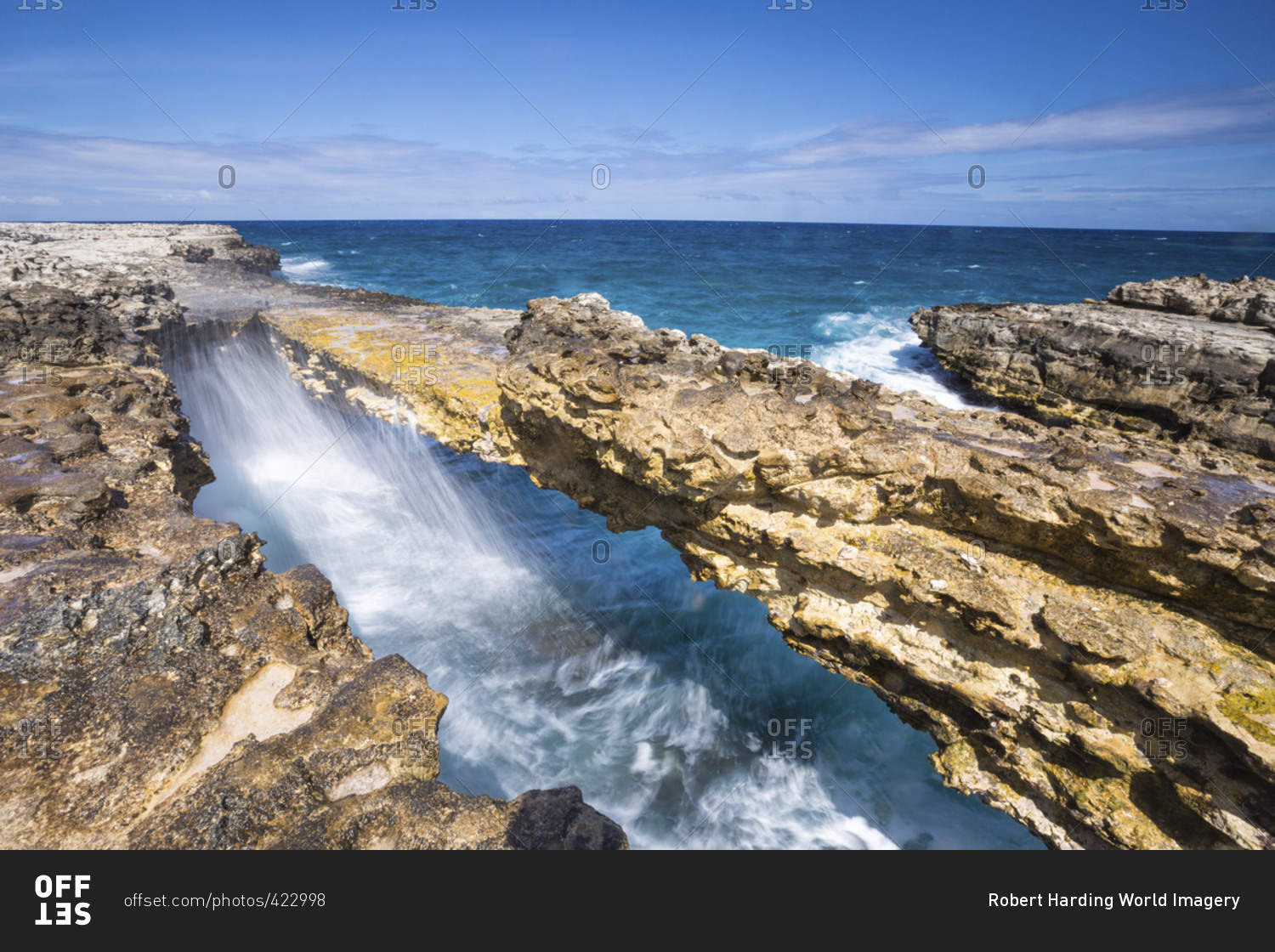 Waves In The Natural Arches Of Limestone Devil's Bridge, Antigua ...