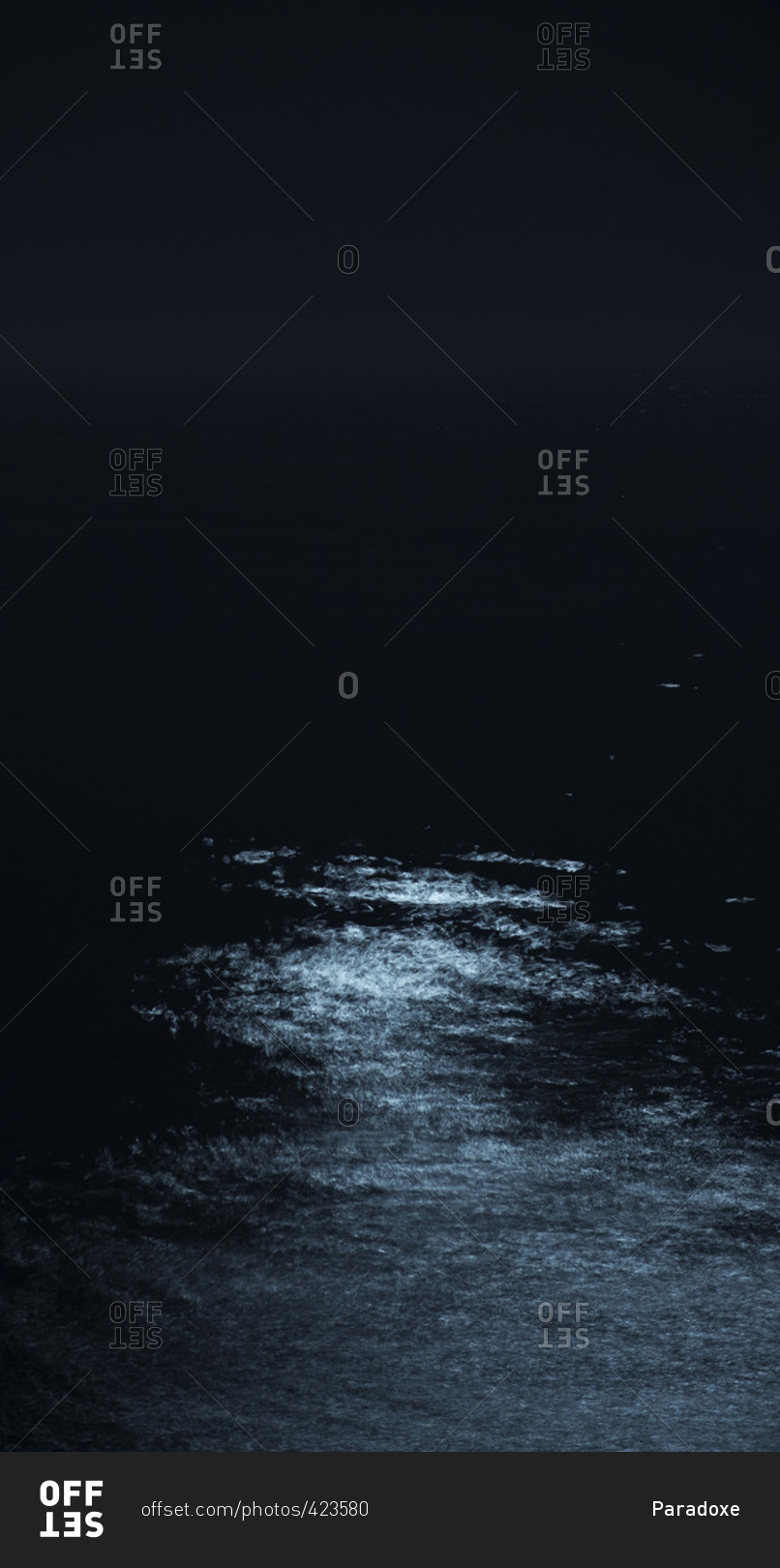 Moonlight reflected on ocean at night
