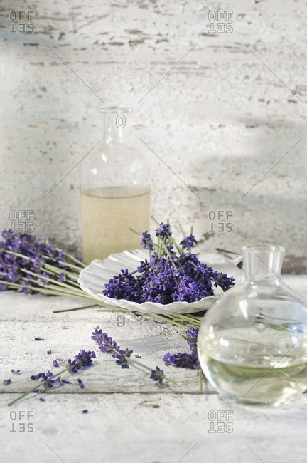 Glass bottles of lavender oil and lavender water