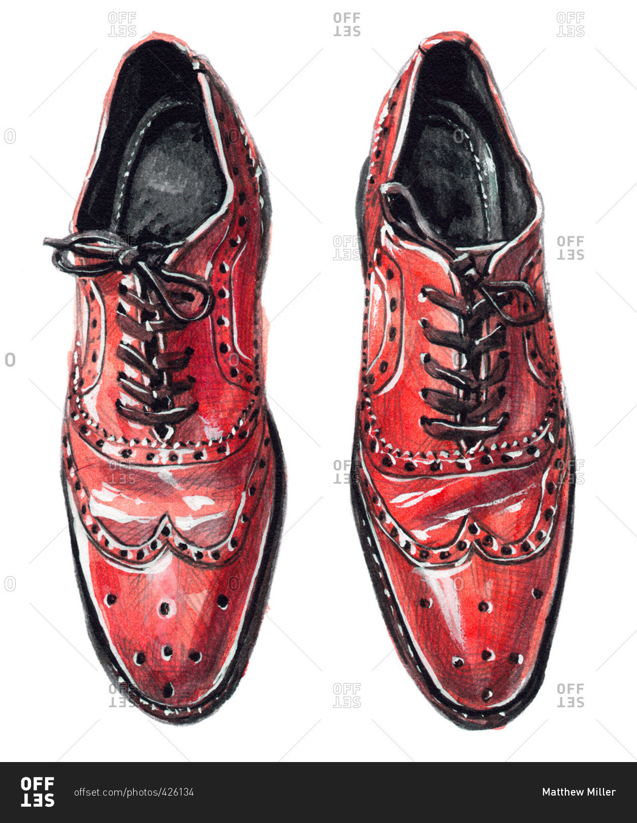 Red wingtip Oxford shoes with tied laces stock photo - OFFSET