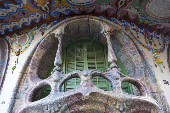 Barcelona, Spain - March 8, 2012: Colorful design of the Casa Comalat by Salvador Valeri Poporull, in Eixample district in Barcelona, Catalonia, Spain