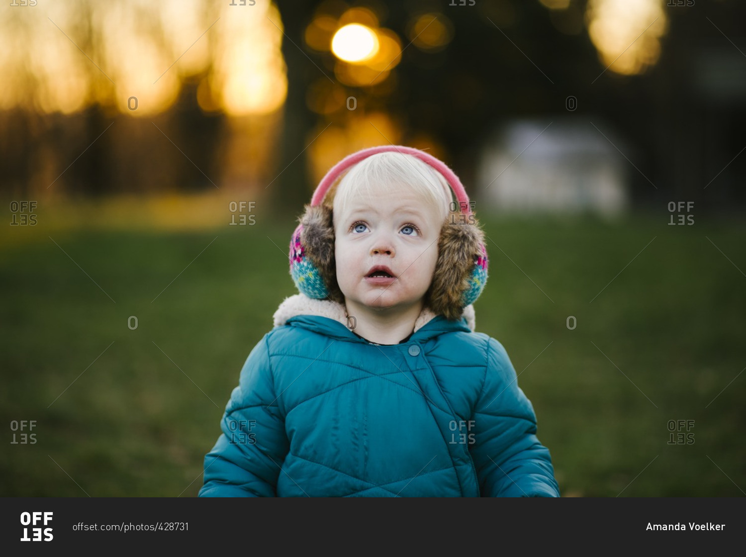 Toddler boy in earmuffs Offset stock photo OFFSET