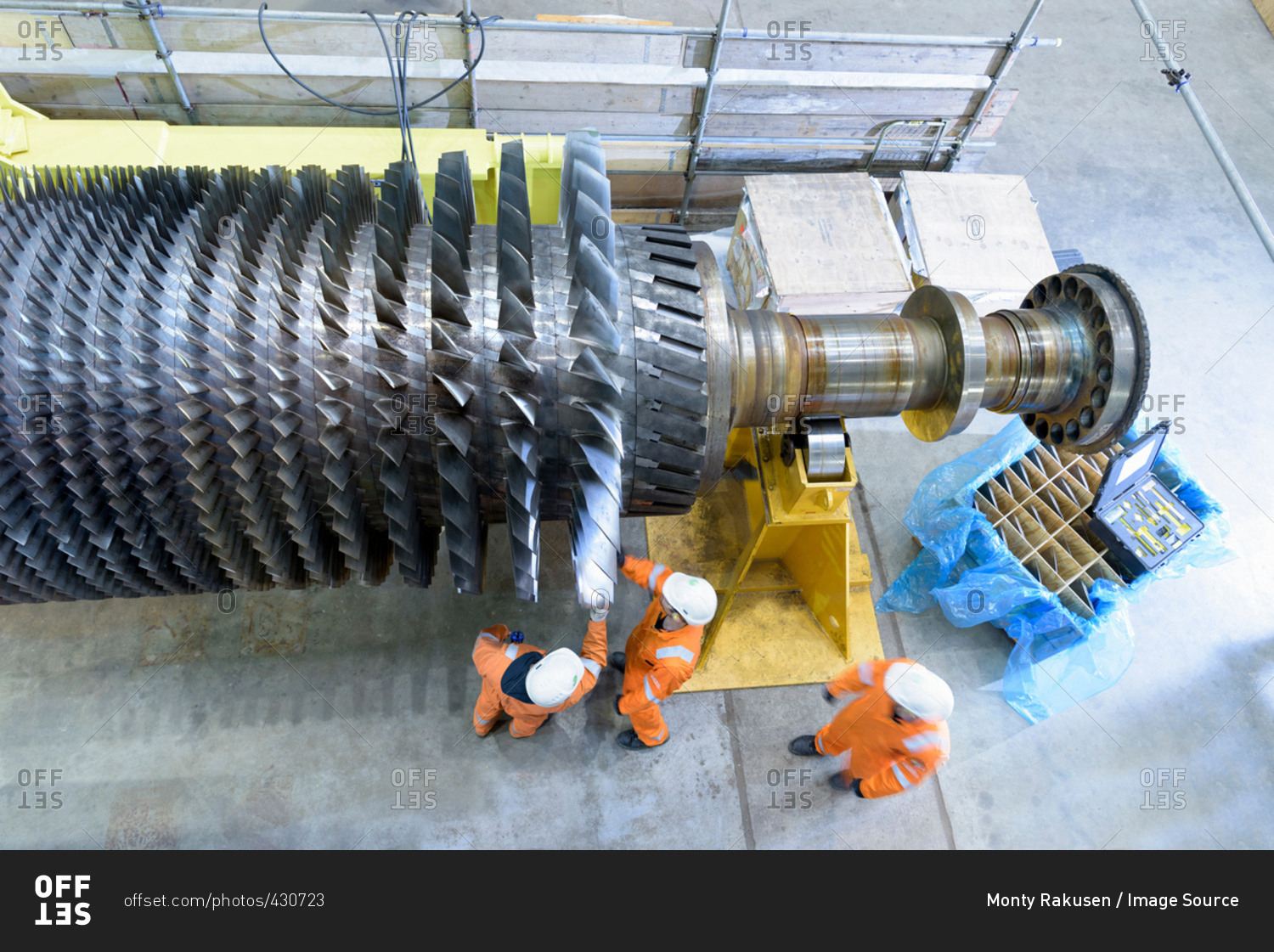 Overhead view of gas turbine under repair in gas-fired power station