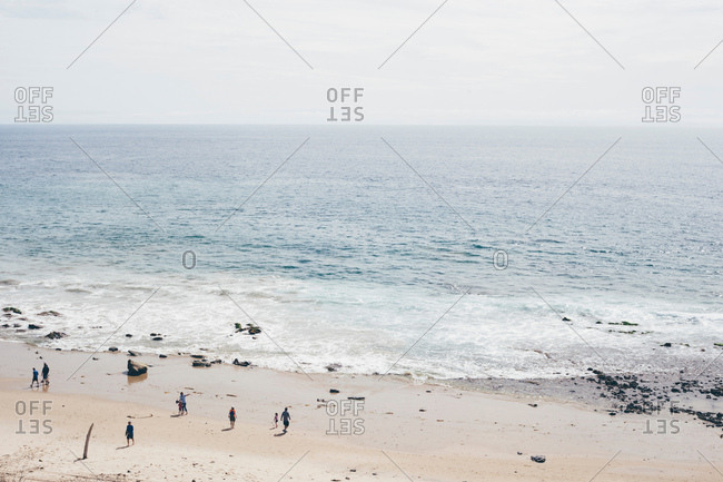 Elevated distant view of people on beach, Crystal Cove State Park, Laguna Beach, California, USA