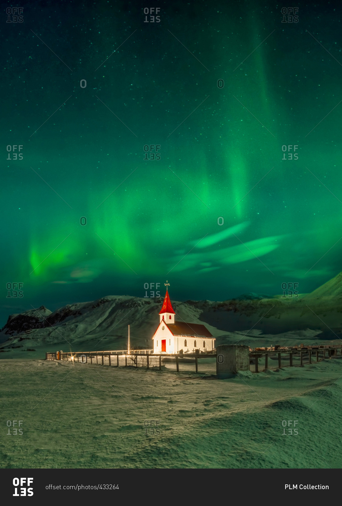 Northern lights over Vik i Myrdal Church in Vik, Iceland stock photo