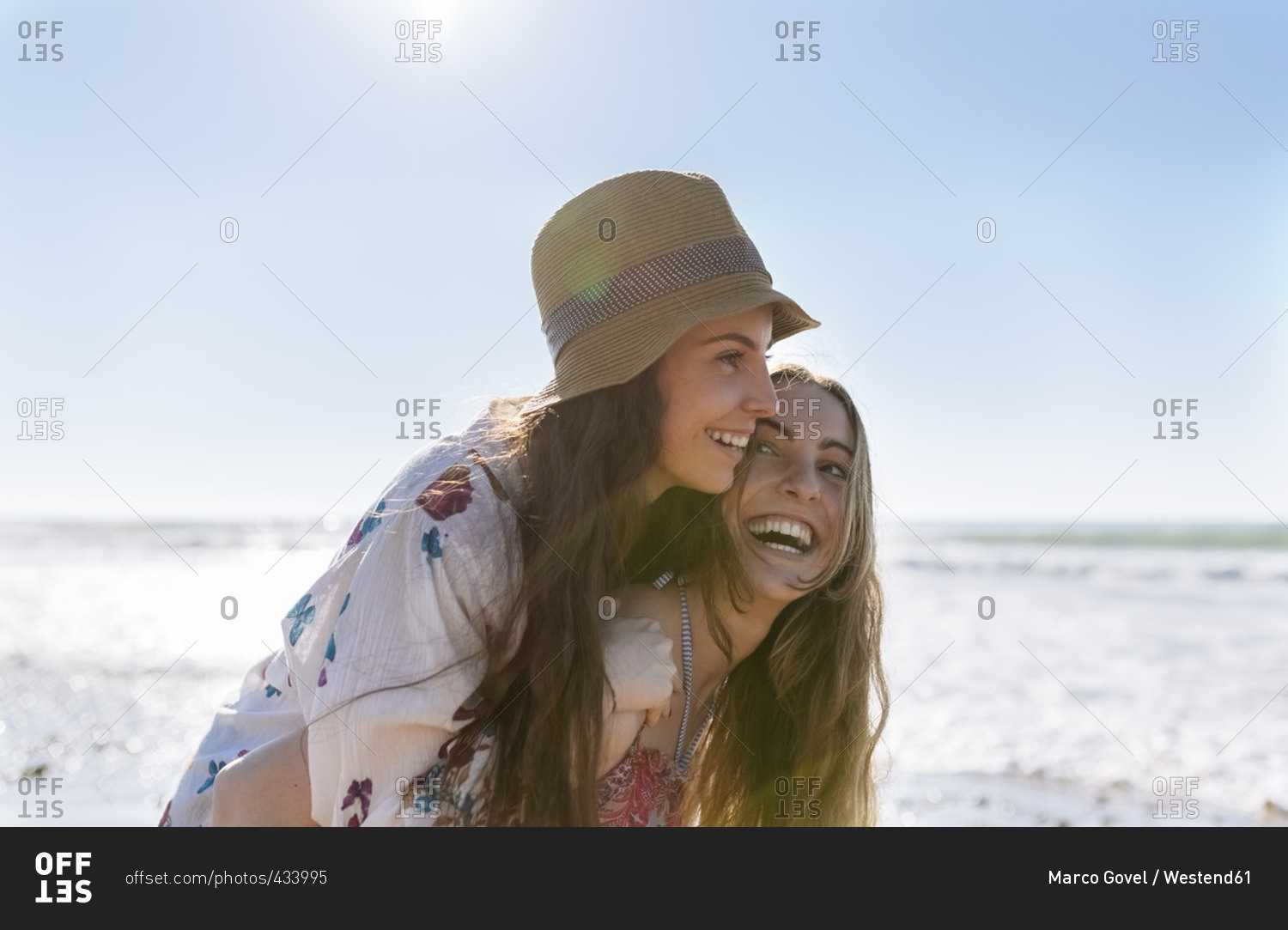 She good friend. Girl gives girl Piggyback.