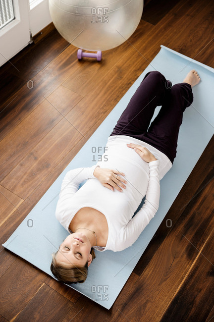 yoga mat lying stock photos - OFFSET