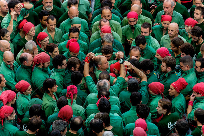 Members of the 'Gausacs' human tower team before forming a 'castell' (human tower) during the XXVI human towers, or 'castells', competetion in Tarragona on October 1, 2016.