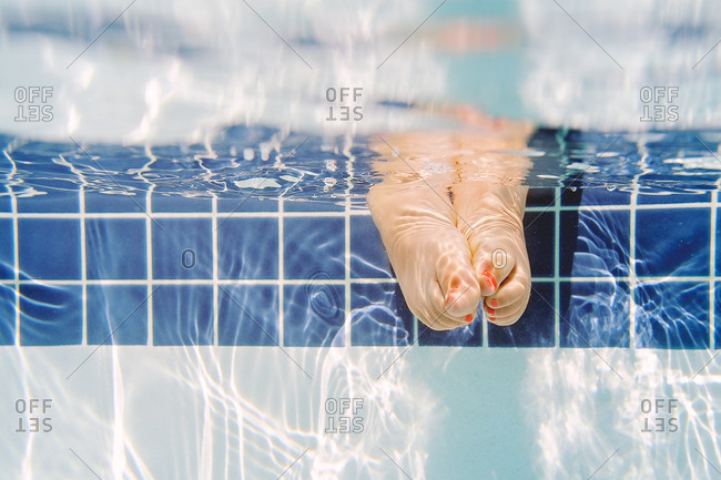 Toes in a swimming pool