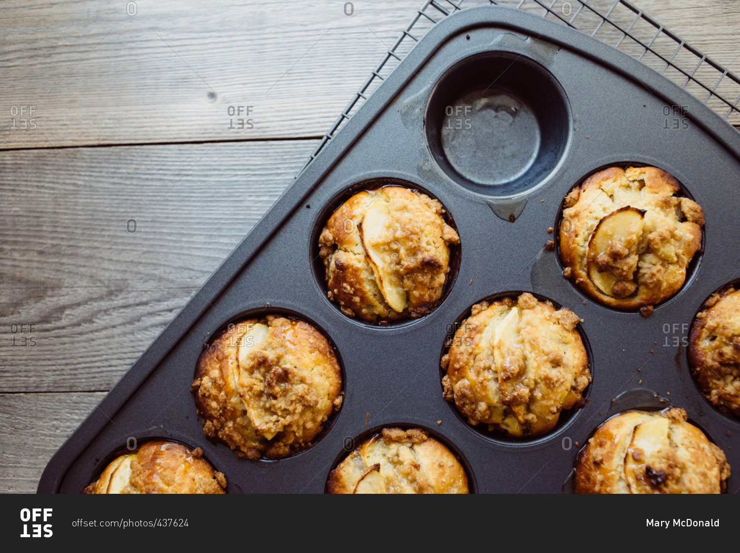 Apple muffins in a baking pan