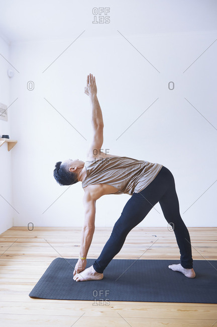 A man in a yoga position