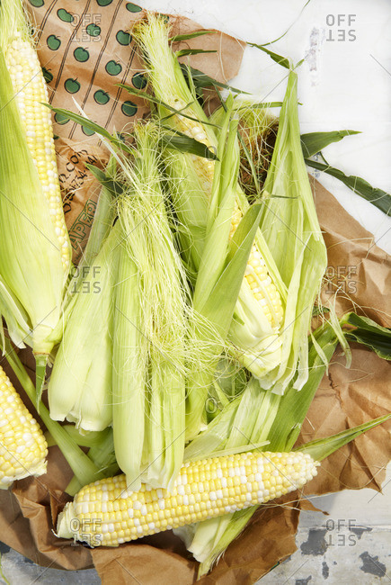 Raw corn and husks