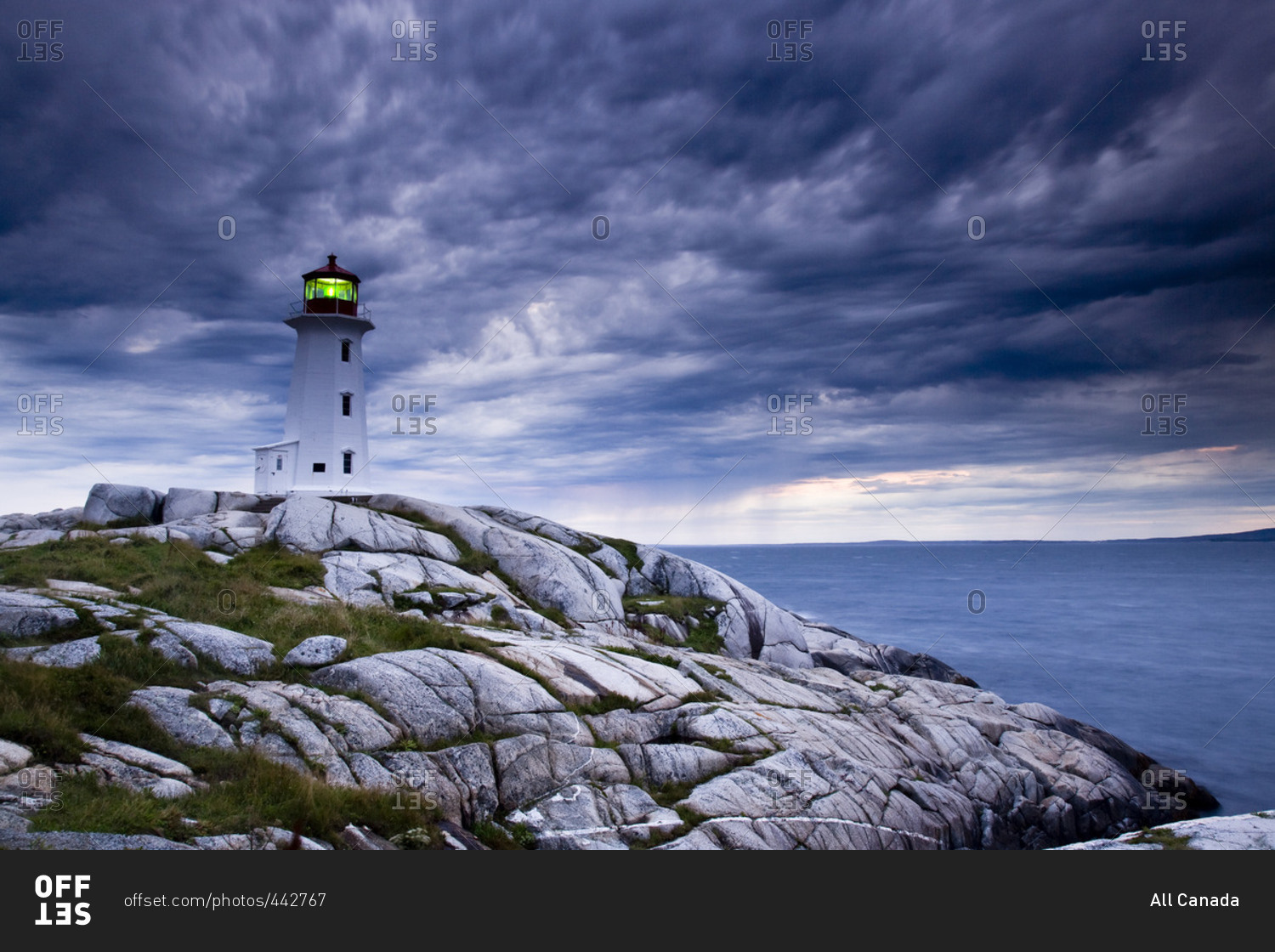 Lighthouse at Peggy\'s Cove during approaching storm, Nova Scotia, Canada.
