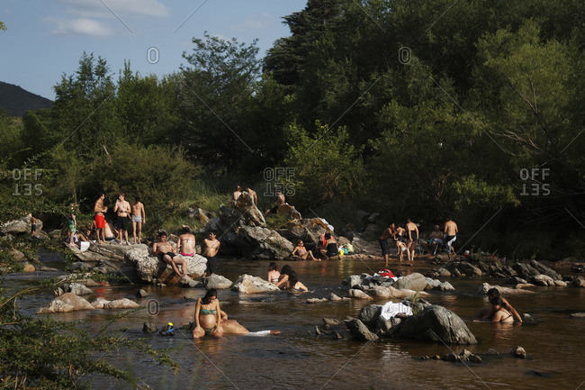 People relaxing on a river