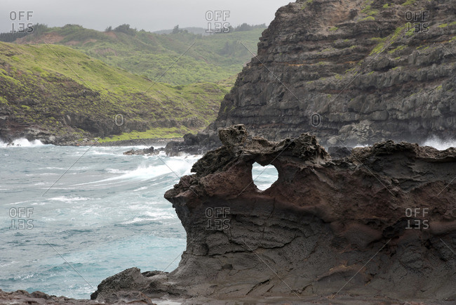 Heart shape in the basalt rock along the coast of western Maui, Hawaii