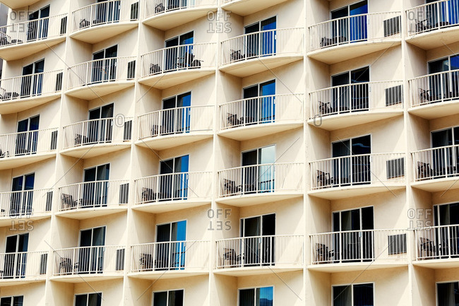 Detail of condominium building with rows of balconies