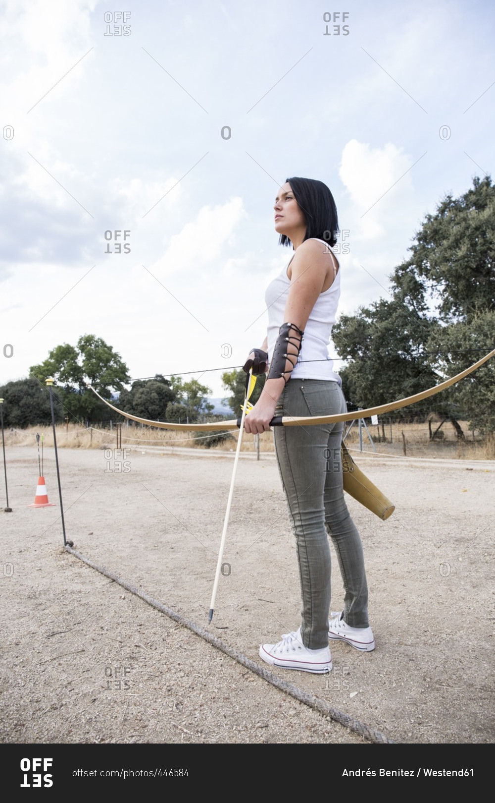 Archeress on sports field
