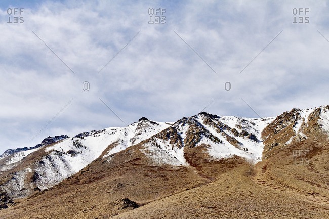 Snowy barren peaks in mountains