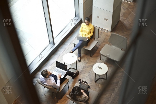 Office employees in a sitting area