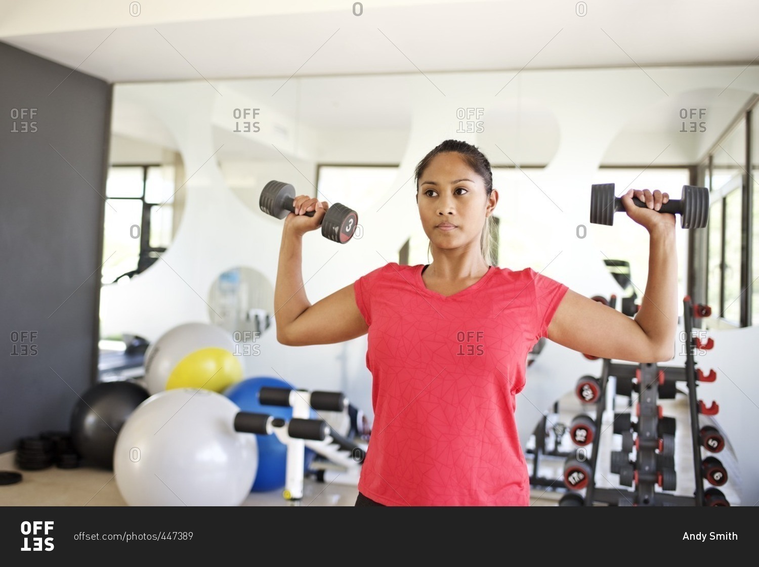 Woman doing arm workout with free-weight