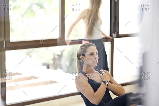 Woman concentrating on ab crunches
