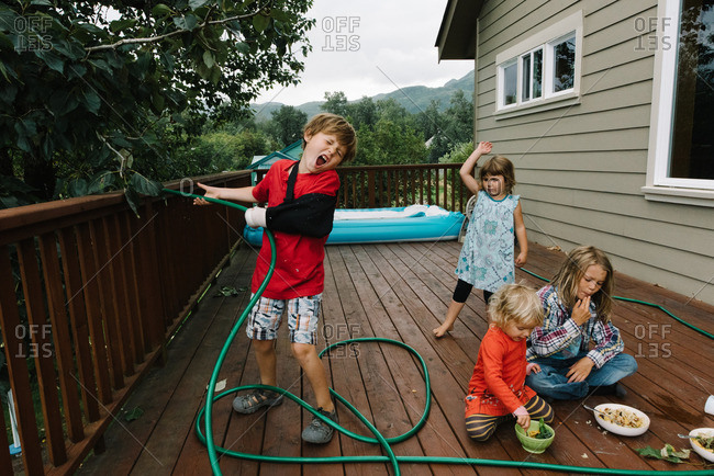 Kids playing on a porch