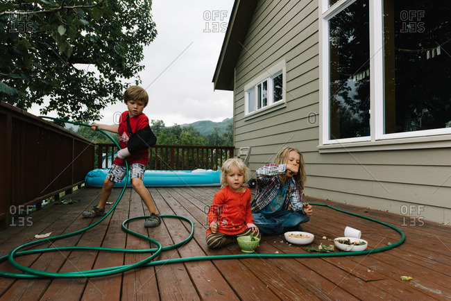 Kids hanging out on their deck