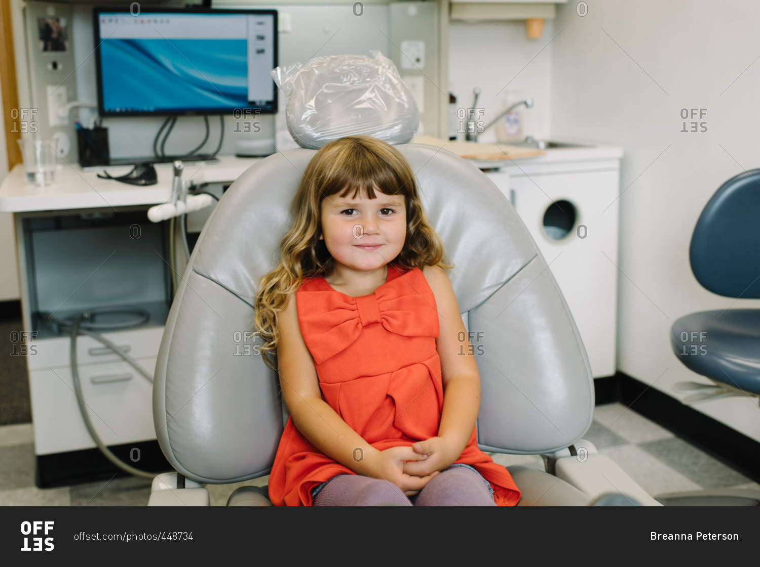 Girl waiting in dentist chair
