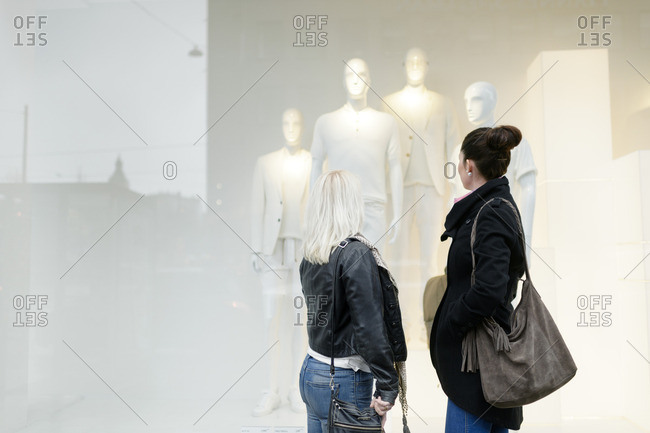 Sweden, Mid adult women window shopping