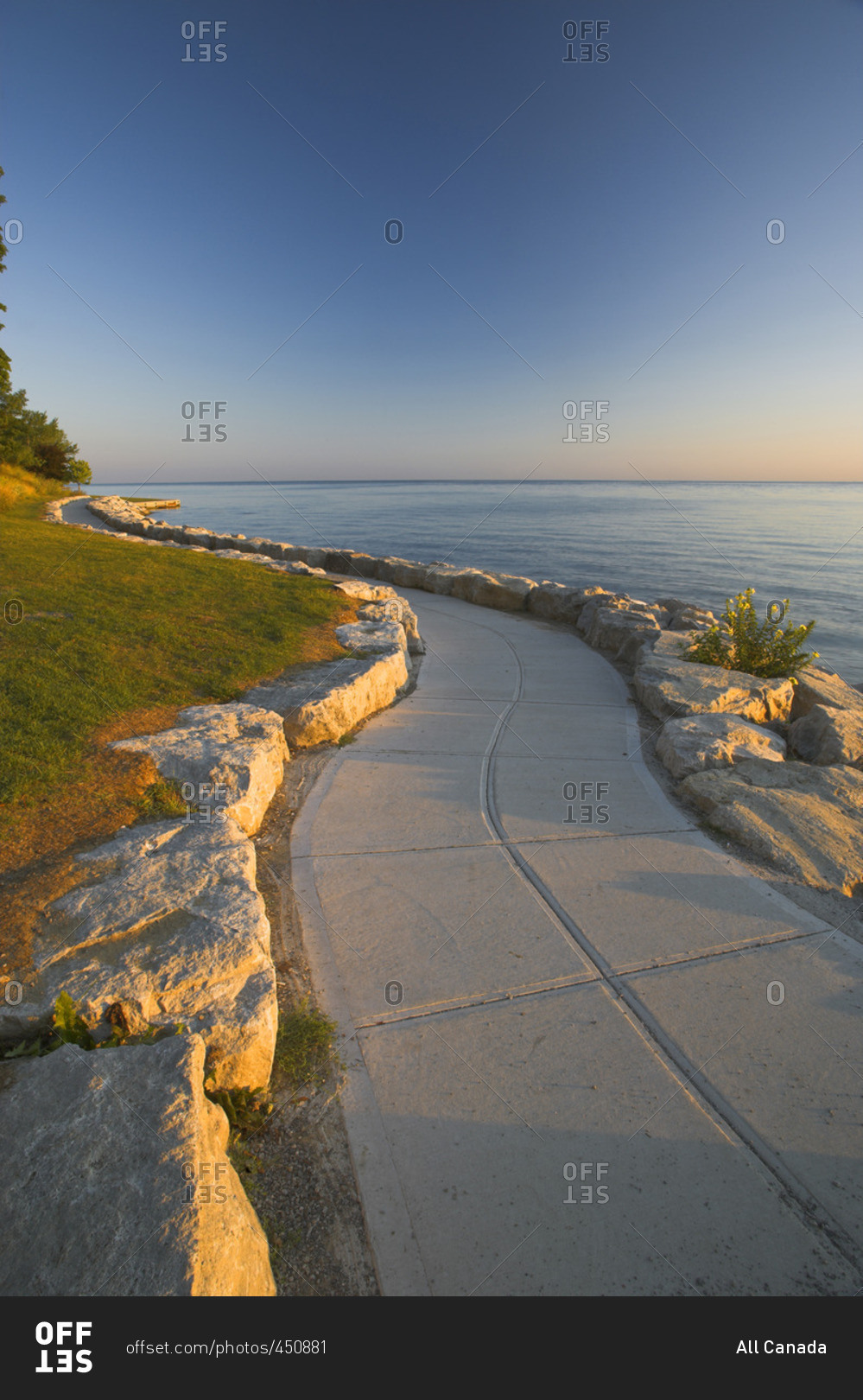 Stone path along the shore of Lake Ontario at sunrise, Niagara-on-the-Lake, Ontario, Canada