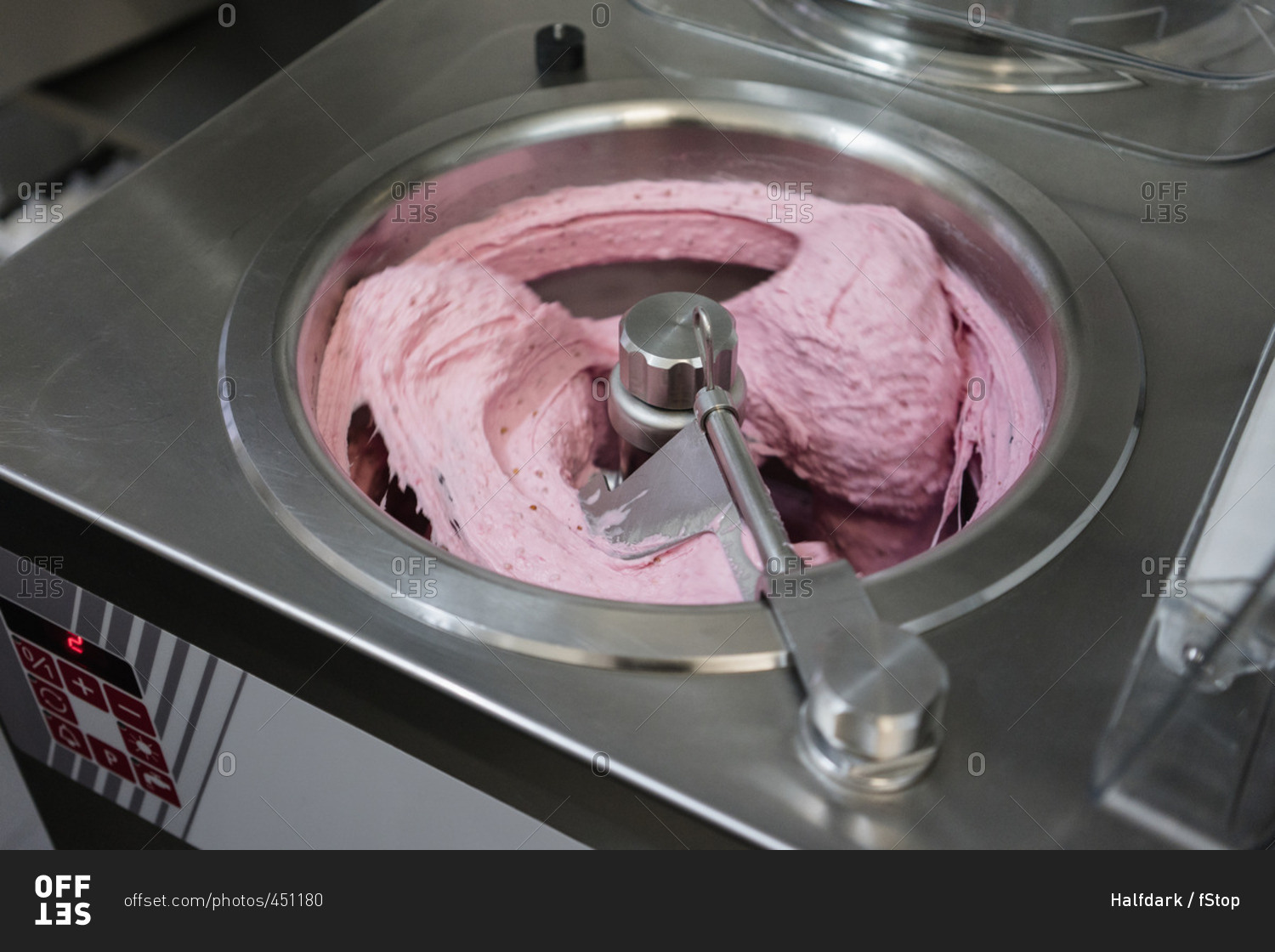 High angle view of ice cream mixing in machinery at store