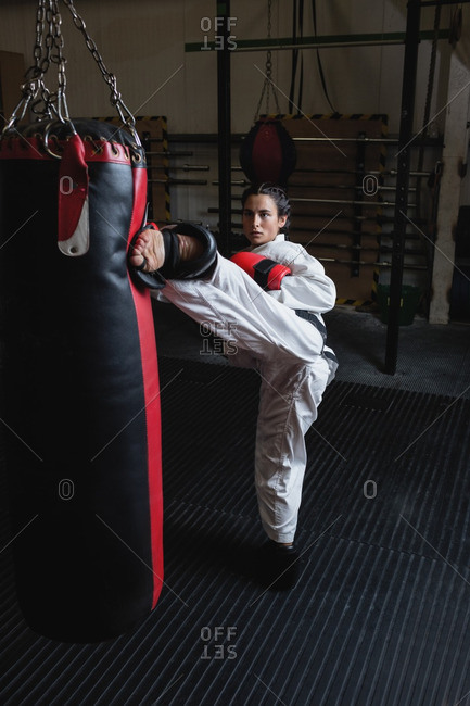 Fighter Girl Hug Punching Bag with Legs and Training Hits Stock Image   Image of fighter fight 191227465